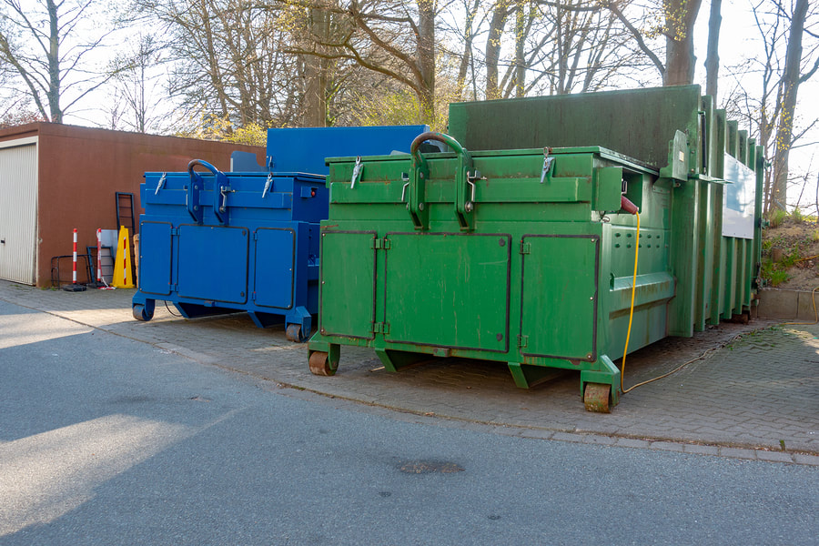 blue and green dumpster