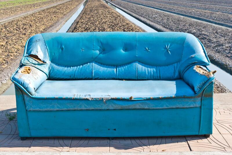 old blue sofa outside
